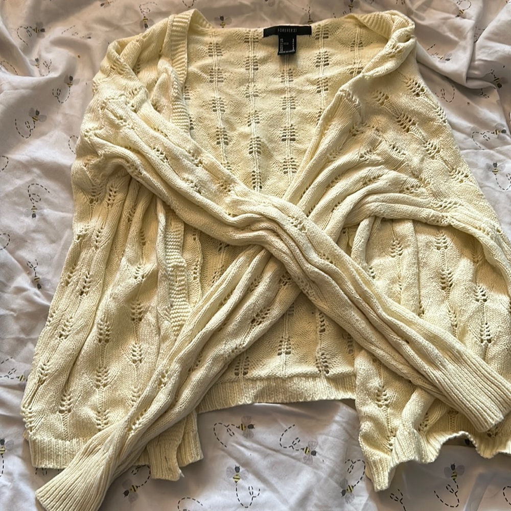 Yellow knitted sweater